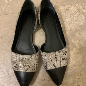 Black and white snake skin flats